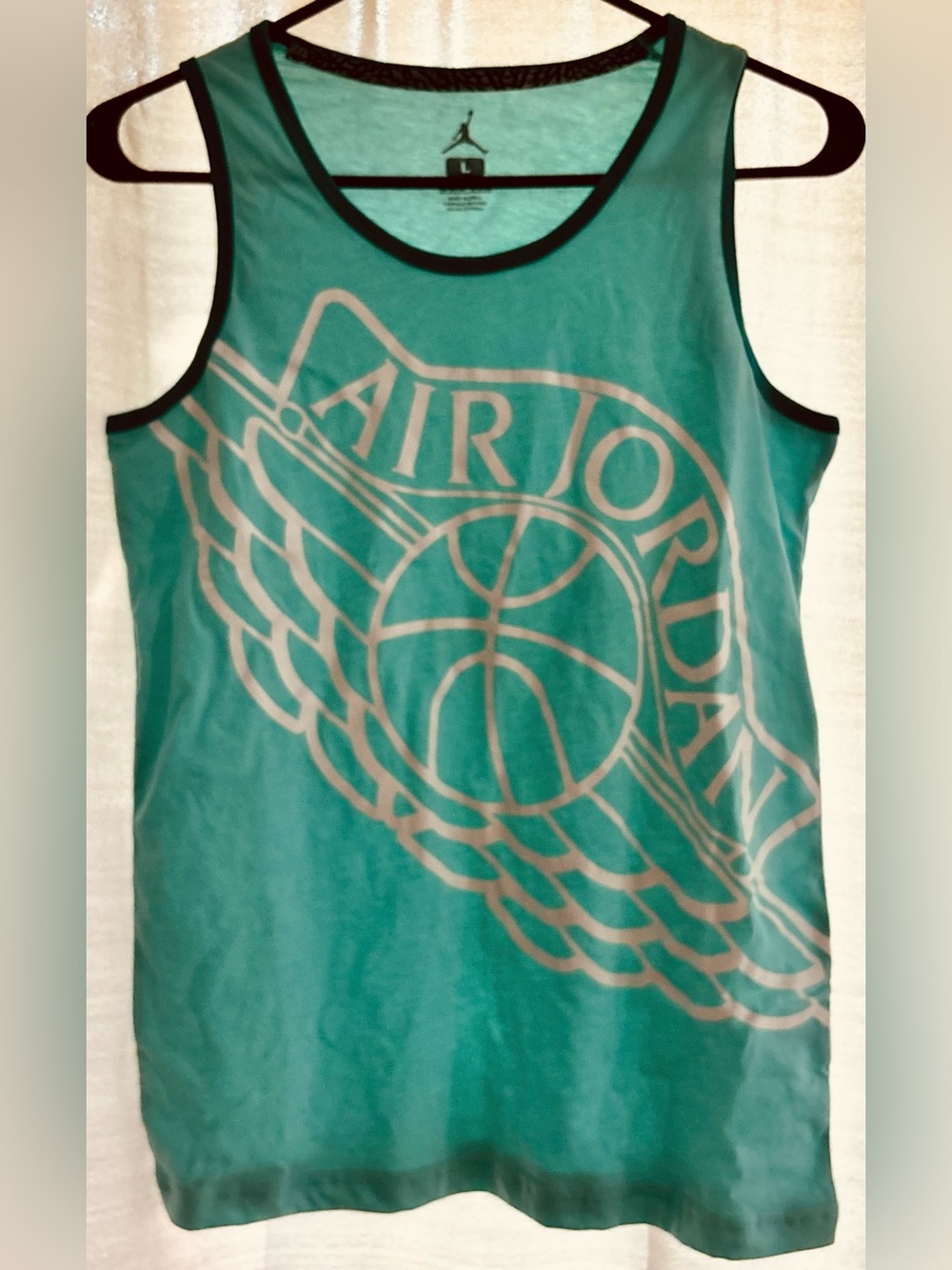 Retro Boy’s Jordan Teal Blue Tank Top with white “Air Jordan” basketball size L